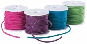 Flat suede leather cords on colorful spools
