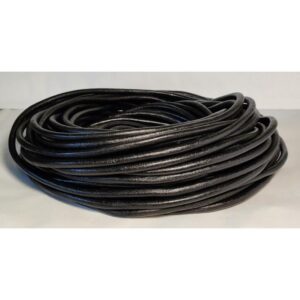 Coiled black round leather cord on a light background.