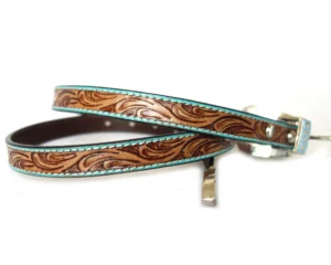 Hand-tooled custom leather belt USA with western floral carving and turquoise accents.