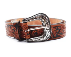 Brown floral tooled leather belt with ornate silver western buckle.